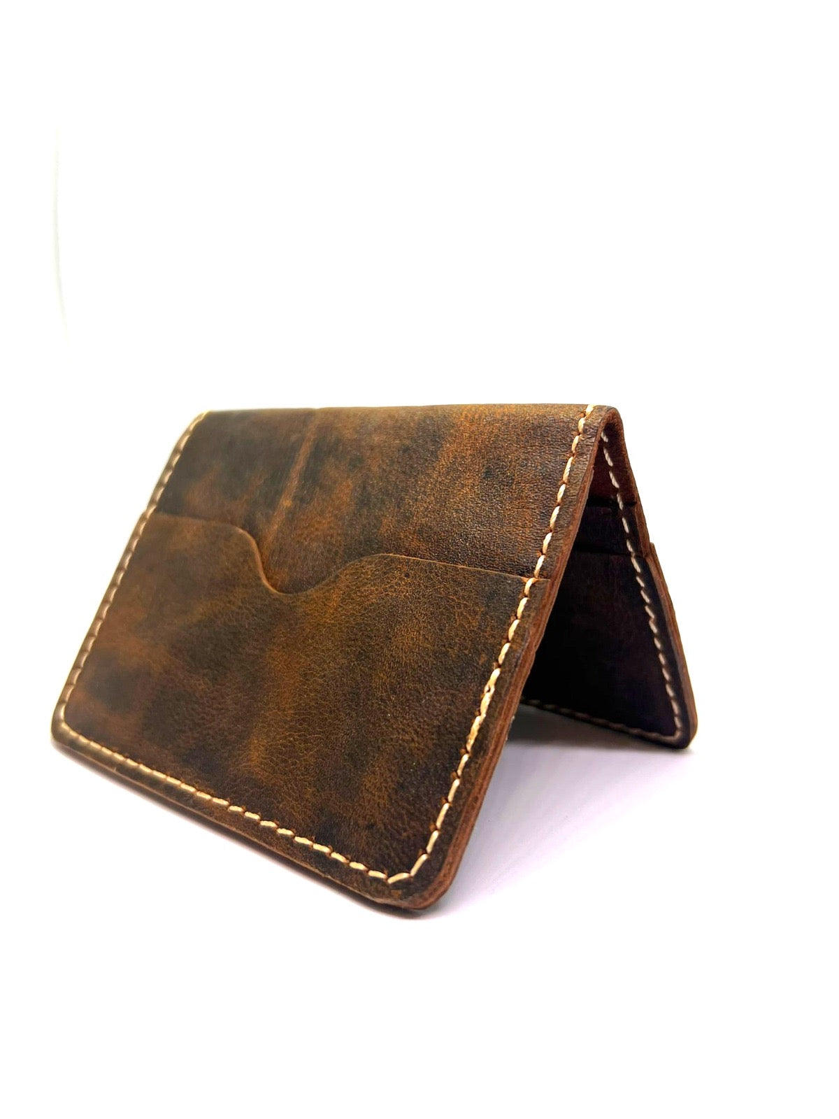 ICONIC LEATHER with simplicity and durability of genuine leather wallet with RFID blocking Enabled design