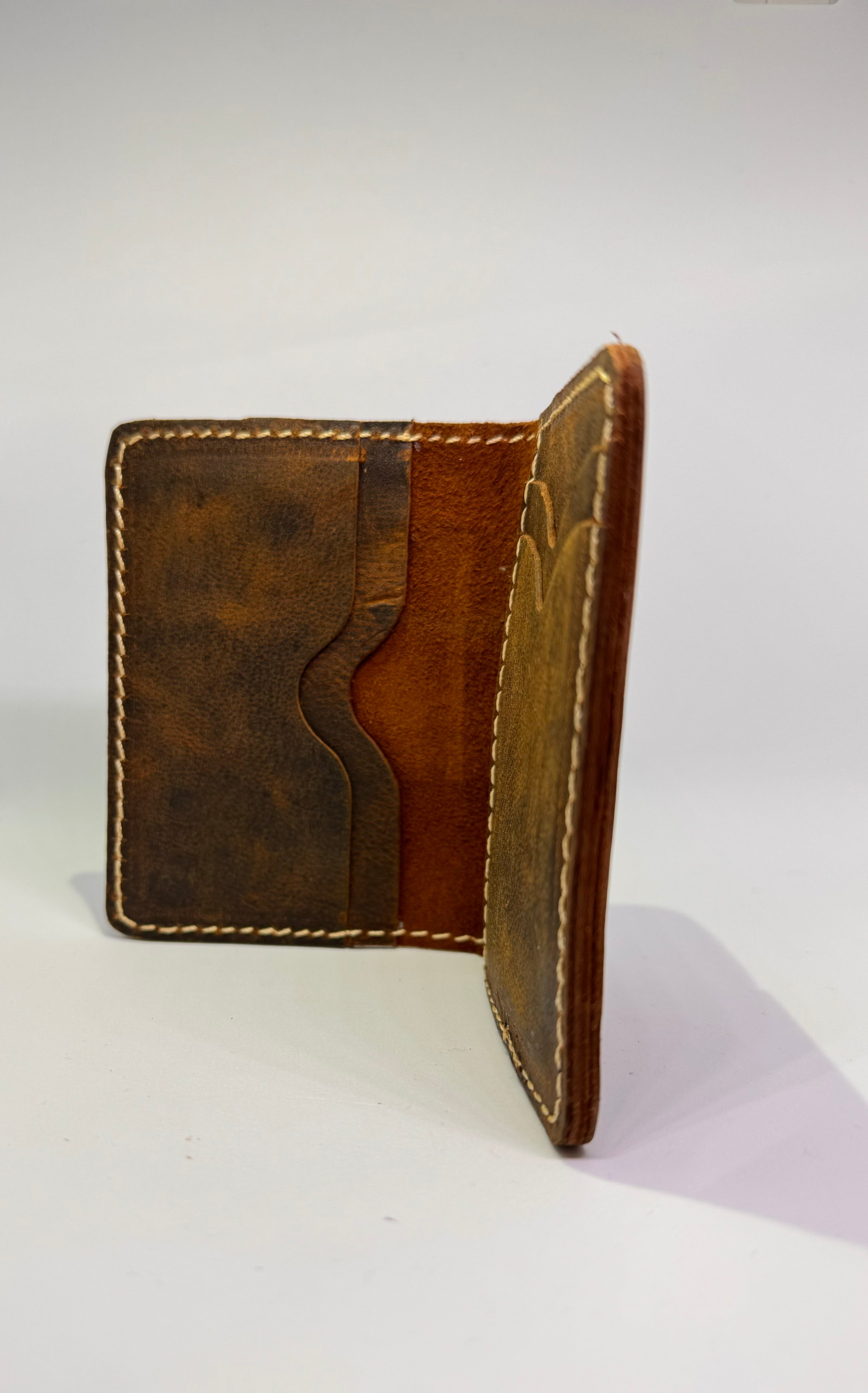 ICONIC LEATHER with simplicity and durability of genuine leather wallet with RFID blocking Enabled design