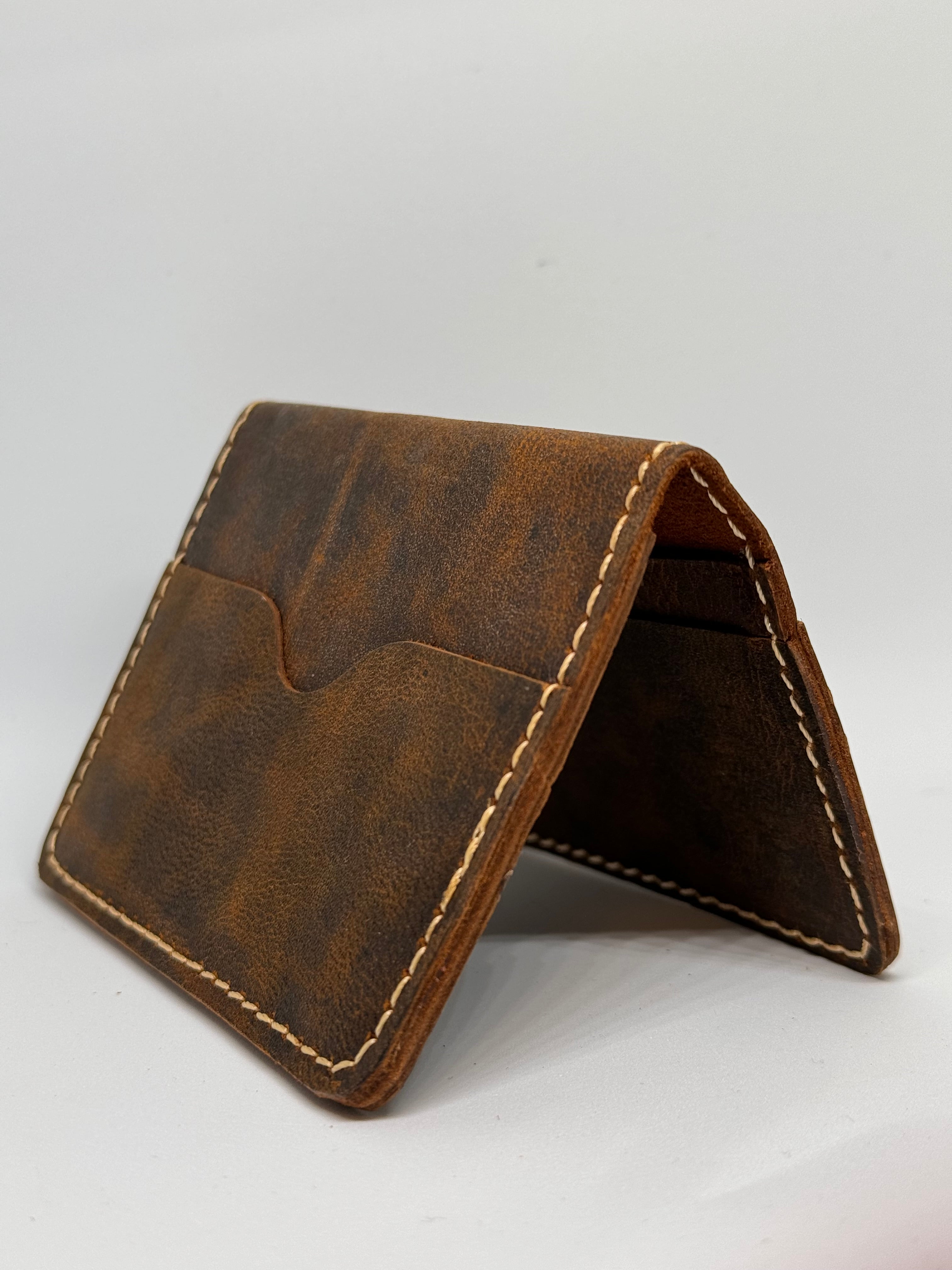 ICONIC LEATHER with simplicity and durability of genuine leather wallet with RFID blocking Enabled design